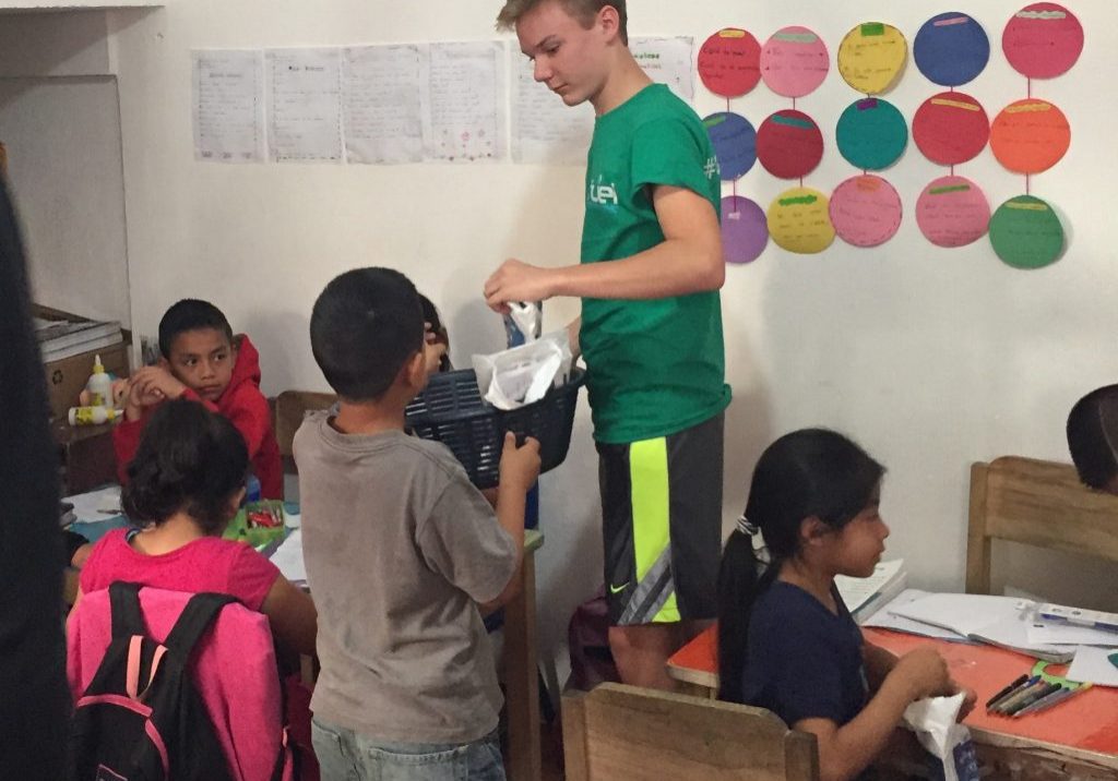 FullSizeRender 4 Kevin Agner hands out dental hygiene kits to third graders at Escuela Integrada.