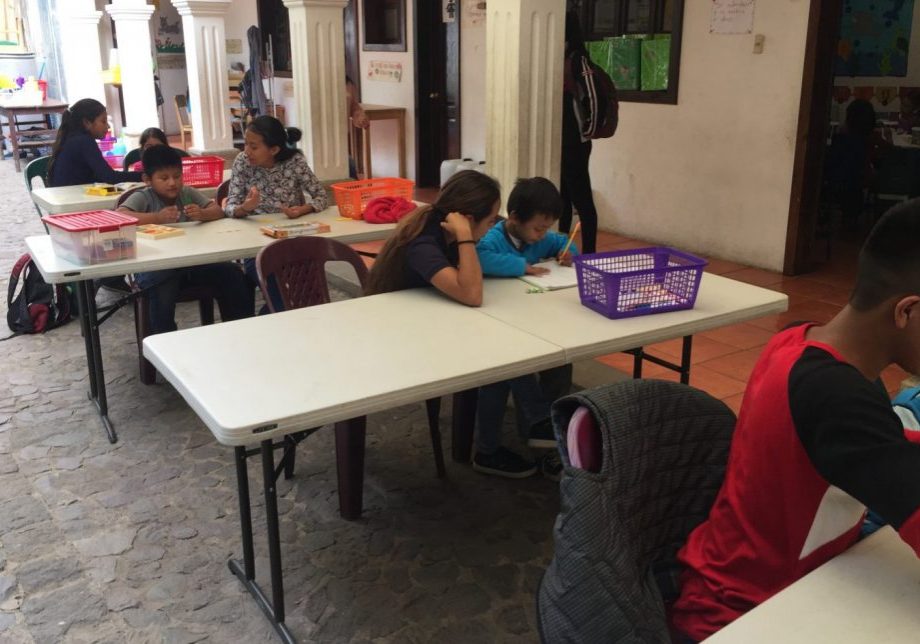 Tutoring_2 Honors Club members tutor elementary students to help them with their academics.